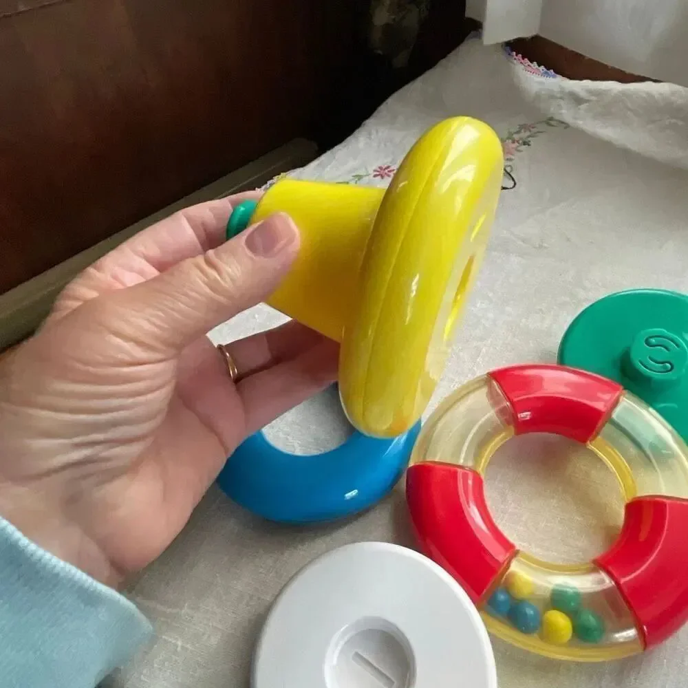 1996, Ring ‘n Roll Gerber Products Co. Toy Biz, Inc roundish rolling rattle infa